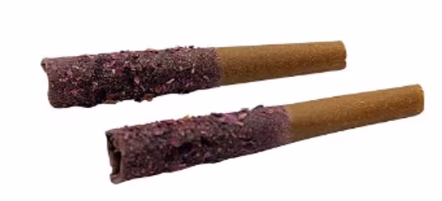 Two Queen of Bud Red Jasper Diamond Infused cannabis blunts with THCa diamonds, laid side by side on a clean surface.